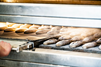 Close-up of person preparing food in store