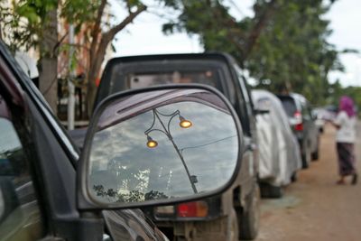 Close-up of car on side-view mirror