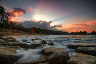 Scenic view of sea against sky during sunset