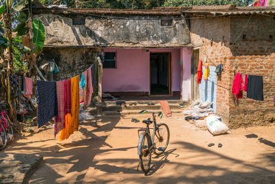 Clothes drying on clothesline outside building