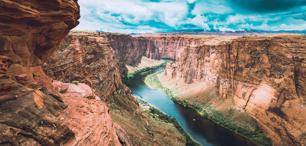 Scenic view of rock formations in water