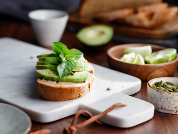 Close-up of fruits in plate on table