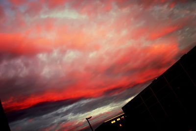 Low angle view of cloudy sky at sunset