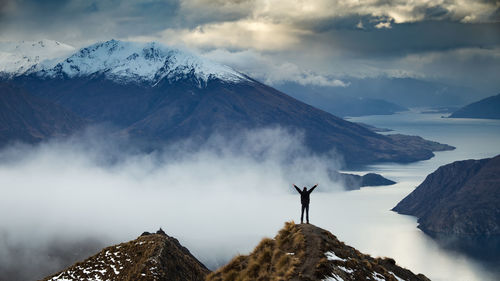 Scenic view of dramatic sky over mountains