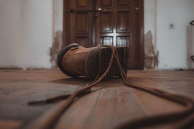 Close-up of shoes on table at home