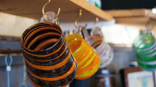 Close-up of mason jars hanging in kitchen