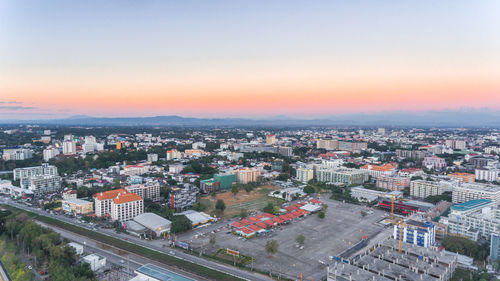 Aerial view of a city at stunset