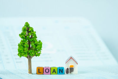 Close-up of stuffed toy on table against white background