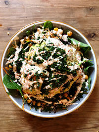 High angle view of salad in bowl on table