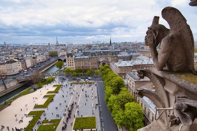 Gargoyle of notre dame cathedral is located at the roof top of the cathedral  