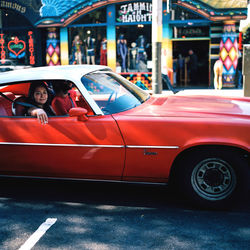 Portrait of woman in car