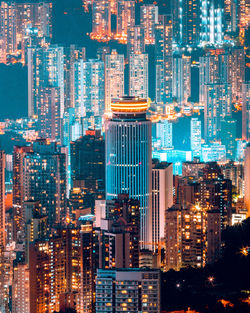 Illuminated buildings in city at night