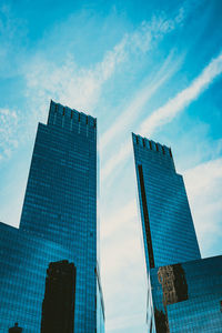 Low angle view of skyscraper against sky