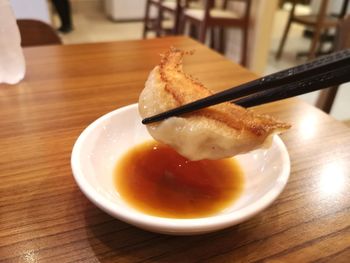 Close-up of ice cream in bowl on table