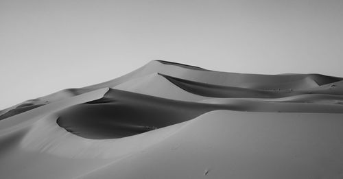 Low angle view of paper against clear sky