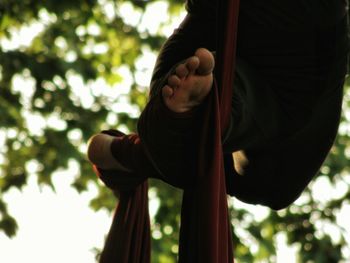 Low section of street performer performing acrobatics