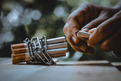 Close-up of man working on table