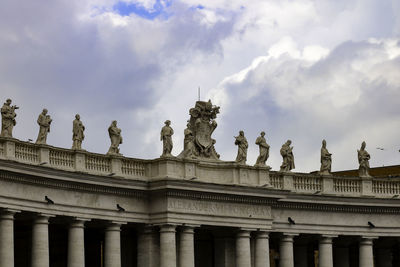 Low angle view of statue against cloudy sky