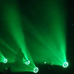 Low angle view of illuminated stage at night