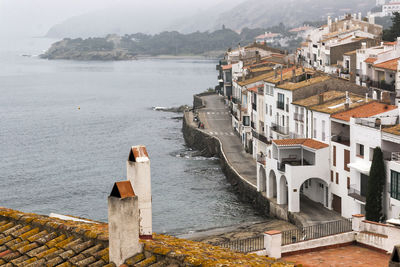 Cropped built structures by the lake