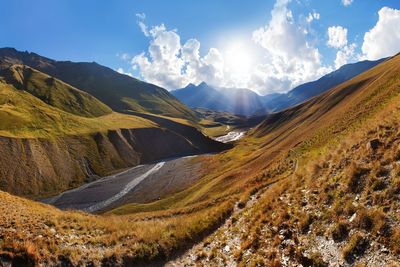 Panoramic view of road amidst mountains against sky