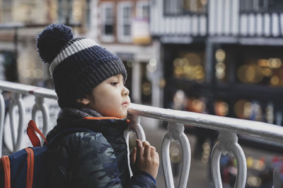 Portrait of cute boy looking away