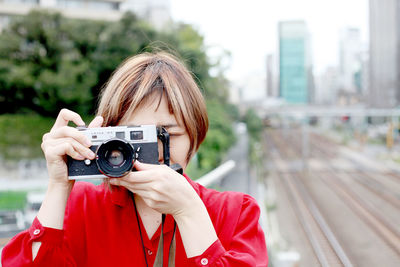 Man photographing with mobile phone