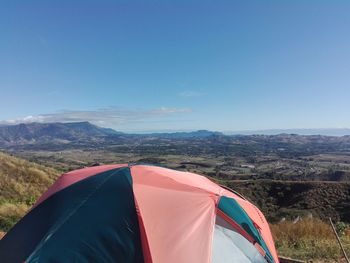 Tent on mountain against sky