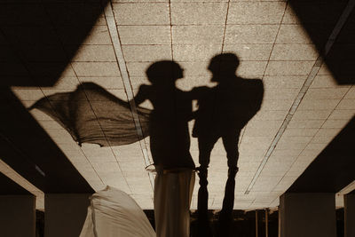 High angle view of woman walking on street