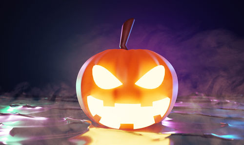 Close-up of illuminated halloween pumpkin