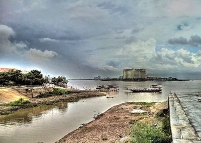 View of river against cloudy sky