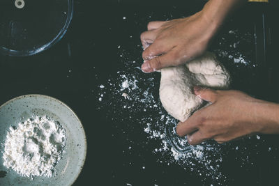 Cropped hand of person washing hands