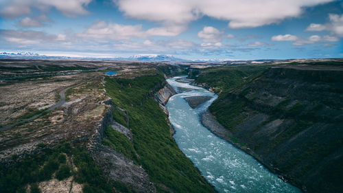 Panoramic view of river amidst landscape against sky