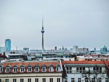 View of communications tower in city