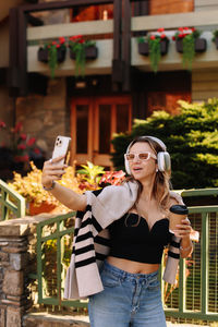 Young woman using mobile phone