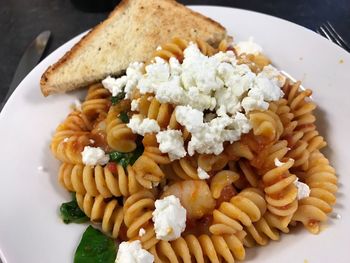 High angle view of shrimp fusilli served in plate on table