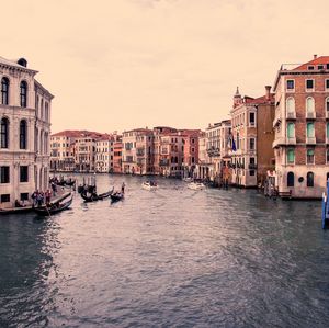 Canal passing through city buildings