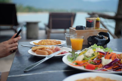 Close-up of breakfast served on table