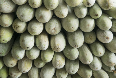 Full frame shot of onions in market stall