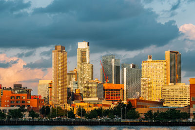 Modern buildings in city against sky