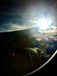 Airplane wing seen through window