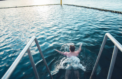 High angle view of woman in sea