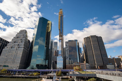 Modern buildings in city against sky