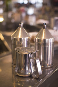 Close-up of wine glasses on table in restaurant