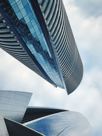 Low angle view of modern building against sky