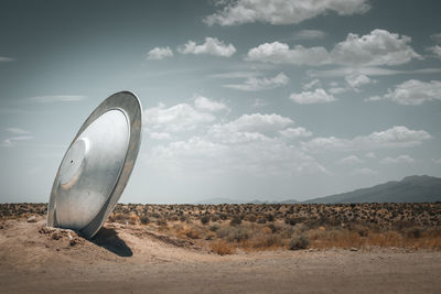 Scenic view of an crashed ufo against sky