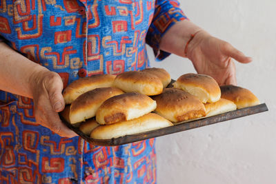 Midsection of man preparing food