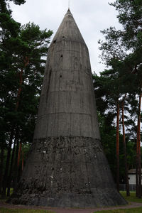 Low angle view of old tower against sky