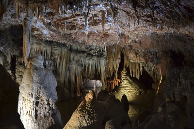 Low angle view of cave on rock