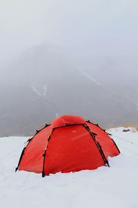 High angle view of red umbrella against sky